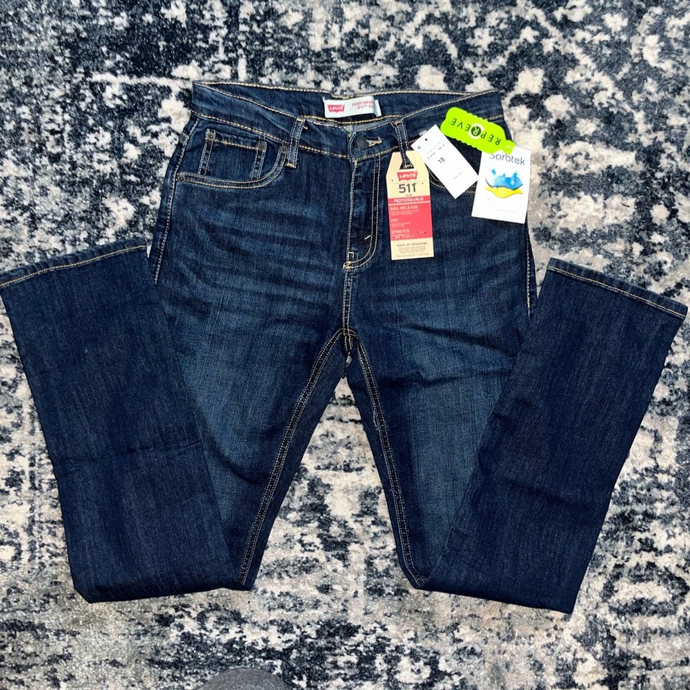 Dark blue straight leg Levi’s performance jeans stretch